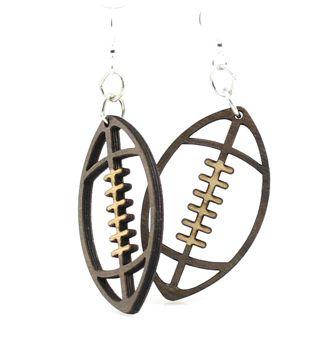 Wooden football-shaped earrings on a white background