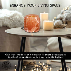 Salt candle holder on a table with decorative elements in a living room setting.