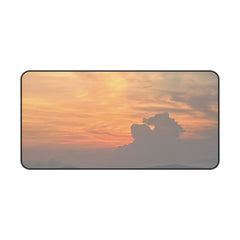 Sunset sky with orange and pink hues.