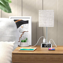 Napoleon Dynamite-themed decor on a nightstand with a lamp, clock, and tablet.