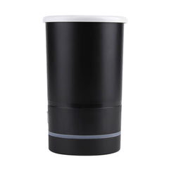 Black cylindrical container with a white lid on a white background
