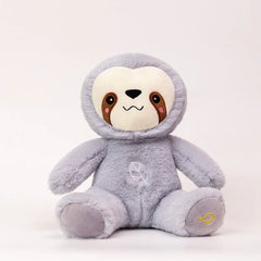 Plush toy sloth with a gray body and white face on a white background