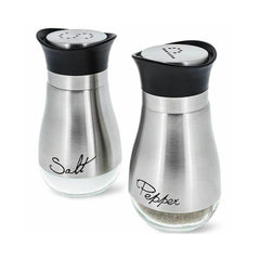 Salt and pepper shakers with black lids on a white background