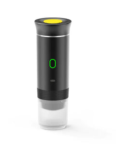Black electric coffee maker opener with a clear base on a white background