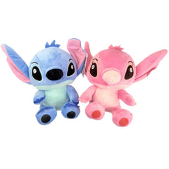 Two plush toys, one blue and one pink, on a white background