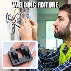 Welding clamp  close-up of the tool and a person wearing a safety vest.