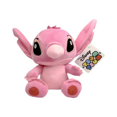 Pink plush toy with a Disney tag on a white background