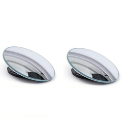 Two oval-shaped mirrors with black bases on a white background