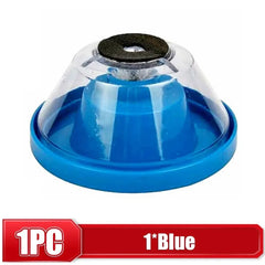 Blue plastic object with clear dome on a white background