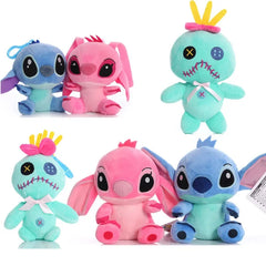 Set of colorful plush toys resembling cartoon characters on a white background