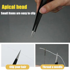 Tweezers with apical head being used to clip hair and thread a needle on a gray background.