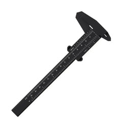Black vernier caliper on a white background