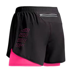 Black and pink athletic shorts with a brand logo on a white background