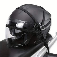Black motorcycle helmet with straps on a white background