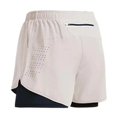 Beige athletic skirt with a zipper pocket on a white background