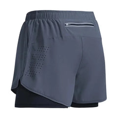 Gray athletic shorts with a zipper pocket on a white background