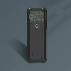 Black electronic device with a green circular component on a dark blue background