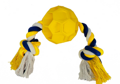 Yellow dog toy with a rope on a white background