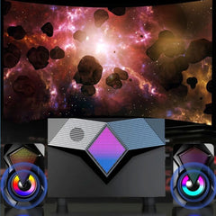 Speakers with colorful lights in front of a space-themed screen