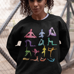 Person wearing a black sweatshirt with colorful yoga pose illustrations.
