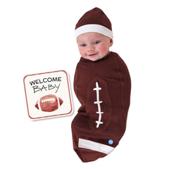 Baby in a football-themed outfit with a 'Welcome Baby' sign on a white background