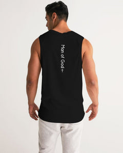 Man wearing a black sleeveless shirt with 'Man of God' text on the back, standing against a white background.