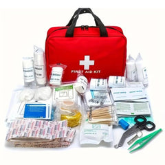 Red first aid kit with various supplies on a white background