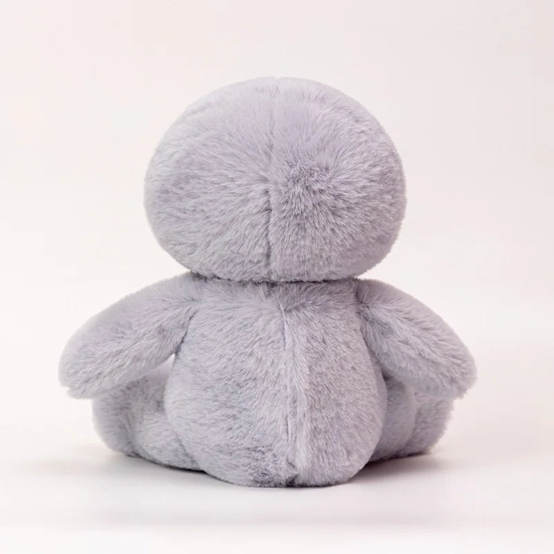 Plush toy with a round body and head on a white background