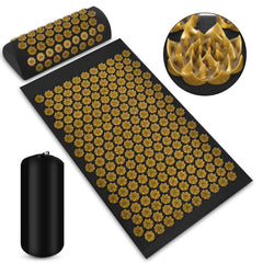 Black acupressure mat with gold nodes and black carry bag on a white background