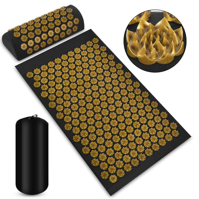 Black acupressure mat with gold nodes and black carry bag on a white background