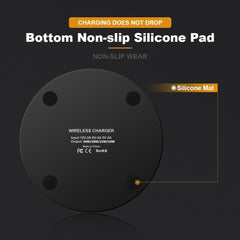 Wireless charger with silicone non-slip properties on a dark background