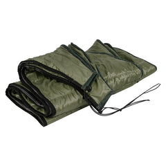 Folded green hammock with black trim on a white background