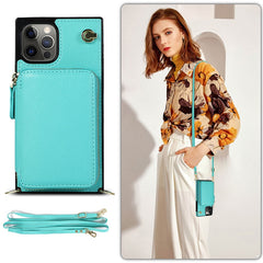 Turquoise phone case with detachable strap, shown on a phone and worn by a person.