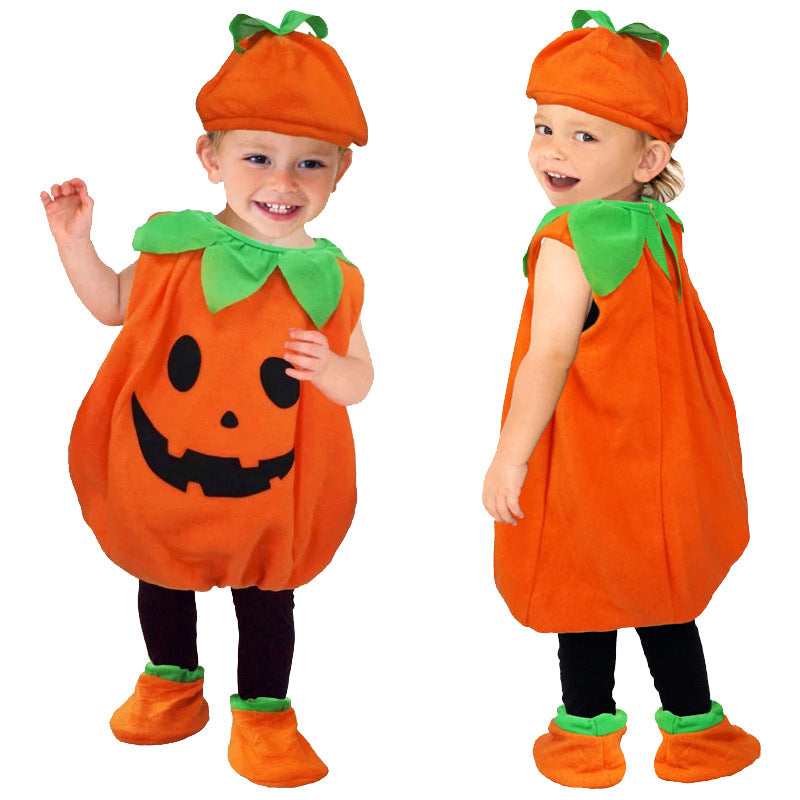Child wearing a pumpkin costume with a white background