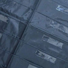 Stack of blue fabric bags with visible stitching details